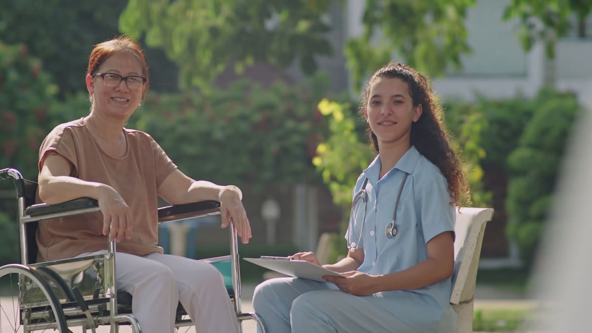 CHCA caregiver assisting a senior client at home